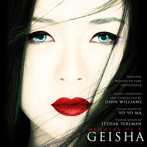 Close-up of a woman with bright blue eyes and red lips on vinyl cover.