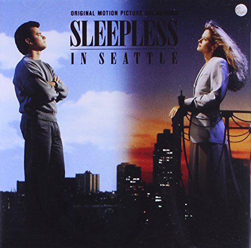 Sleepless in Seattle soundtrack cover featuring Tom Hanks and Meg Ryan against city skyline.