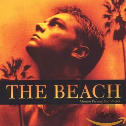 CD cover for “The Beach” soundtrack, featuring a man looking upwards.