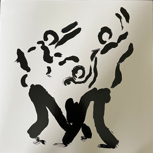 Black abstract figures painted on a white vinyl record cover.