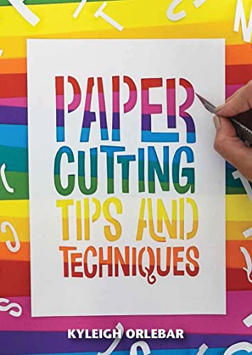Book cover with colorful text reading "Paper Cutting Tips and Techniques".
