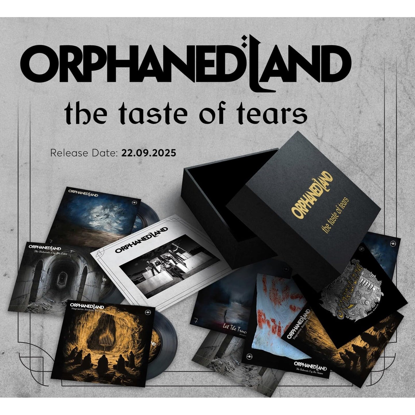 Orphaned Land vinyl record set with box, cards, and record sleeves displayed.