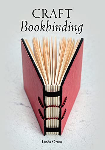 Book with images and text on binding techniques and handmade book covers and pages.