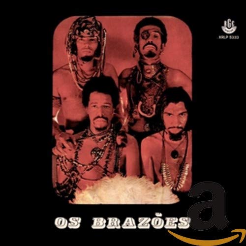 Album cover featuringLC featuring four men in tribal-style accessories against a dark background.