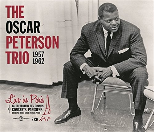 Oscar Peterson Trio album cover, featuring a portrait of Peterson.