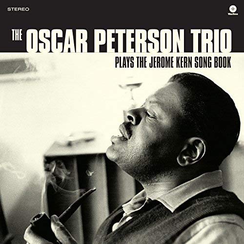 Black and white album cover featuring Oscar Peterson with a pipe.