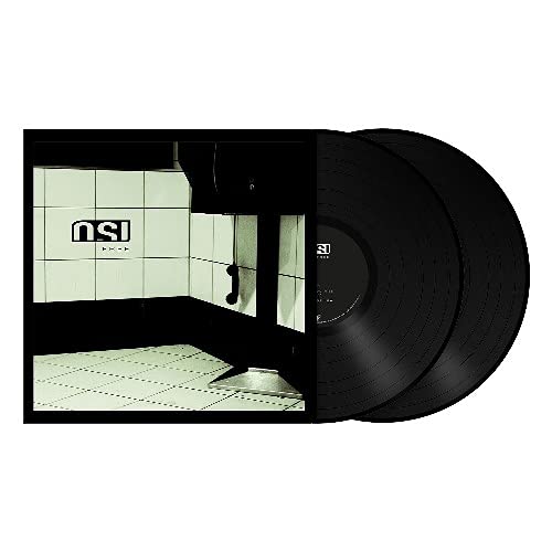 "Album cover featuring a tiled room with 'OSI' and 'FREE' text."