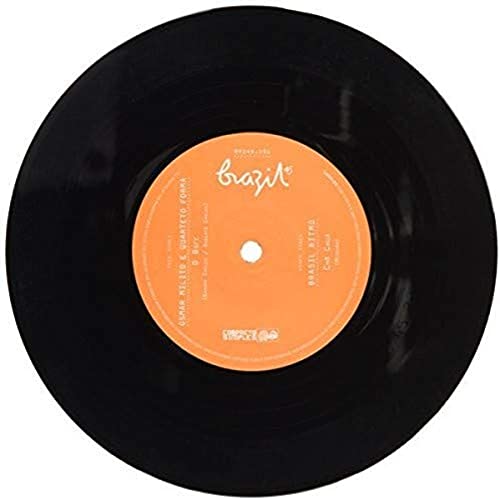 Black seven-inch vinyl record with an orange center label featuring white text.
