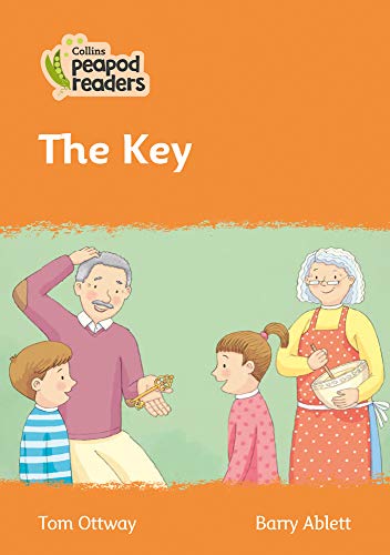 Book cover: “The Key” depicts a family and a small, golden key.