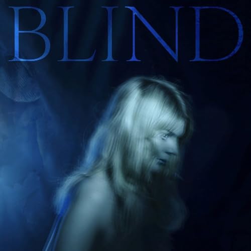 Blurry portrait of a woman with long hair, dark blue background.