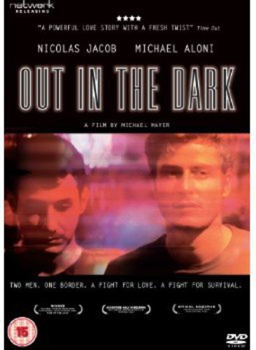 DVD cover for "Out In The Dark" featuring two men in a romantic drama.