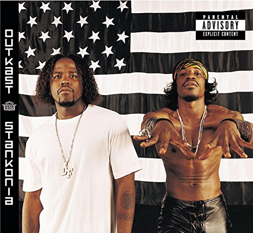 Outkast album cover featuring two men standing before a black and white American flag.