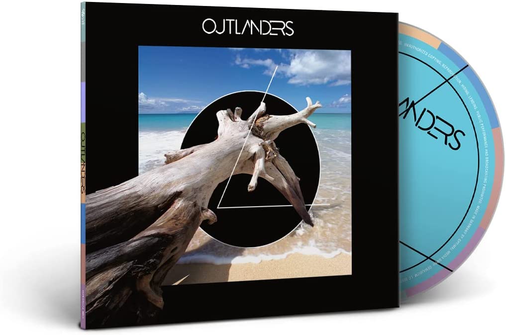 CD case for “Outlanders” featuring a beach, driftwood, and abstract design.