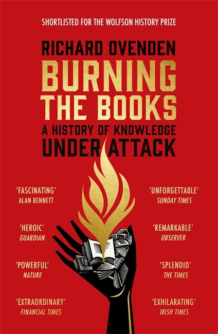 Book cover: “Burning the Books” with a hand holding burning books.