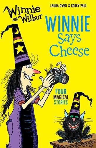 Witch Winnie with camera, black cat Wilbur, and yellow book cover.