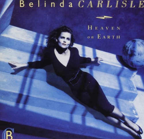 Blue-tinted album cover of Belinda Carlisle titled Heaven on Earth featuring a woman reclining.