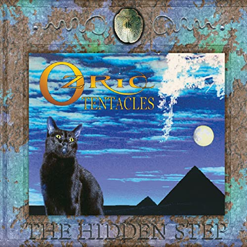 CD cover: black cat, pyramid, moon, and swirling blue sky.