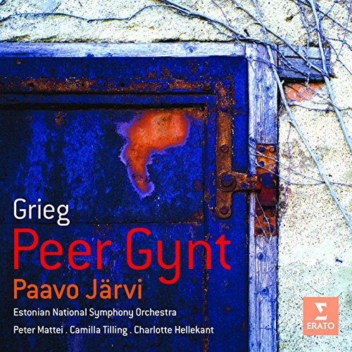 CD cover showing a weathered blue door with rust next to a stone wall.