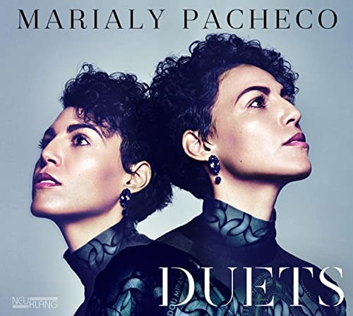 CD cover for Marialy Pacheco’s “Duets” featuring a mirrored portrait.