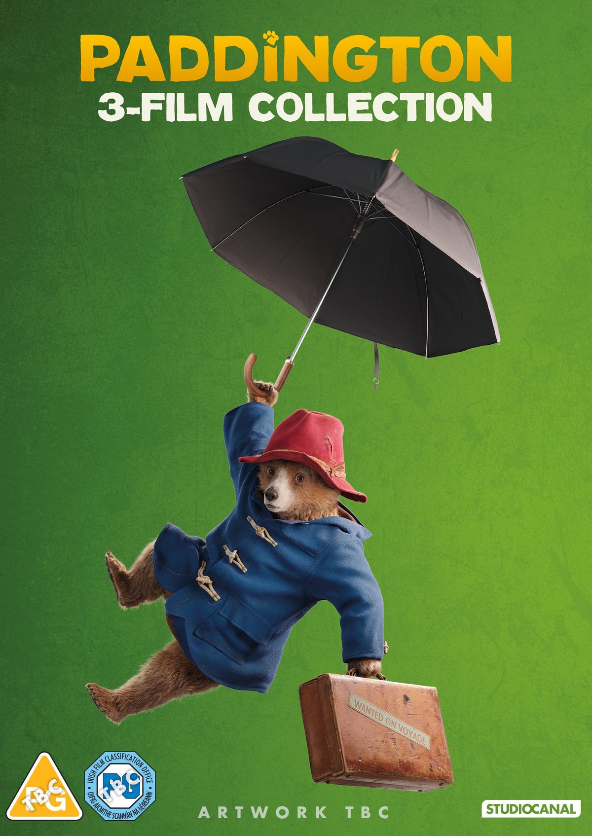 Paddington bear falling with suitcase and umbrella on DVD cover.