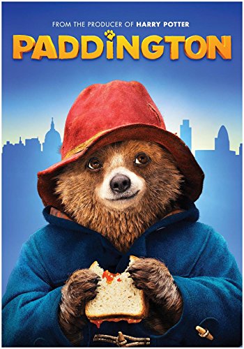Paddington Bear with a red hat holds a marmalade sandwich.