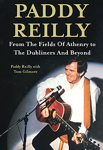Book cover featuring Paddy Reilly playing an acoustic guitar onstage.