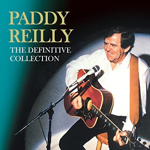 Paddy Reilly album cover featuring a man playing an acoustic guitar.