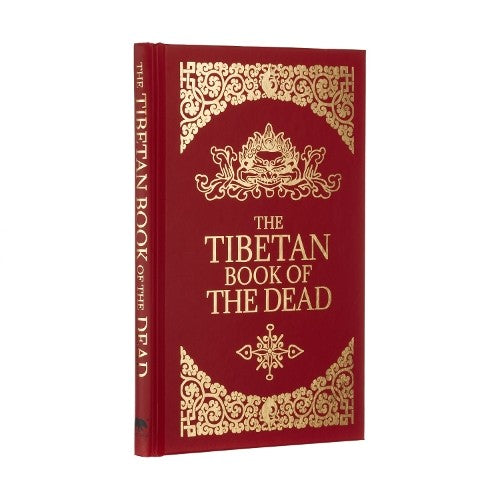 A red hardcover book with gold embossed Tibetan-style patterns and lettering on the cover.