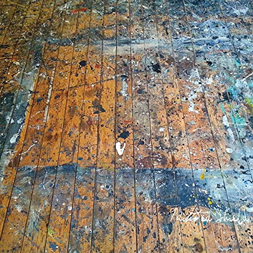 CD cover: paint-splattered wooden floor with a bone shape.