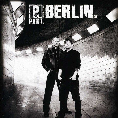 CD cover for Pakt - Berlin, featuring two men in a tunnel.