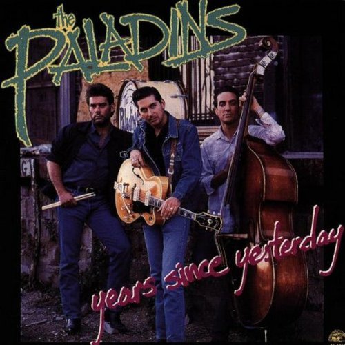 The image shows a CD cover with three men holding instruments. Alt text: "CD cover with three men holding instruments."