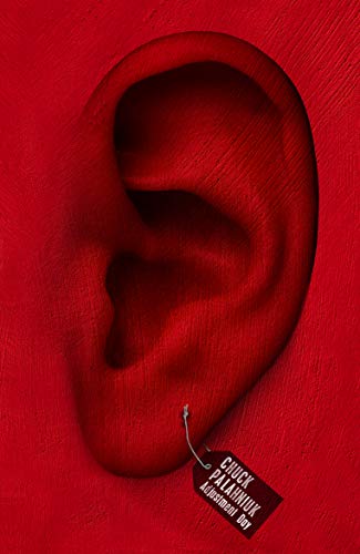 Red background with a large human ear and a small tag.