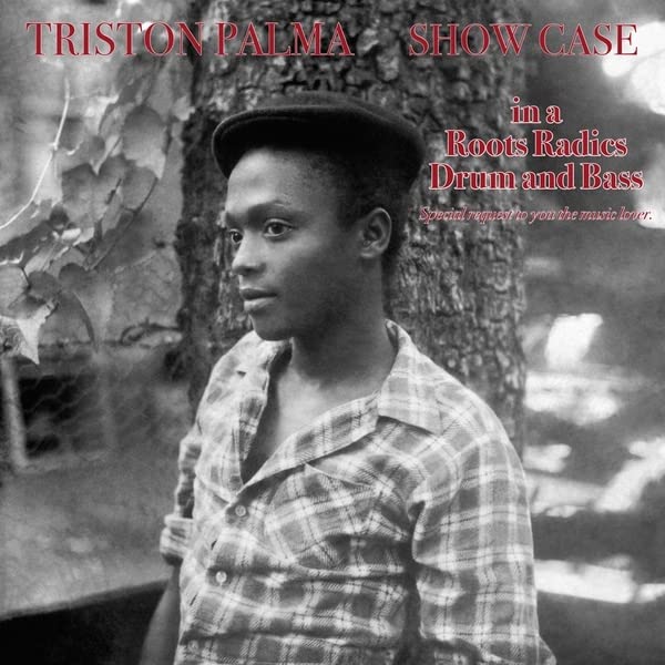 Vinyl album cover featuring portrait of Triston Palma in a checkered shirt.