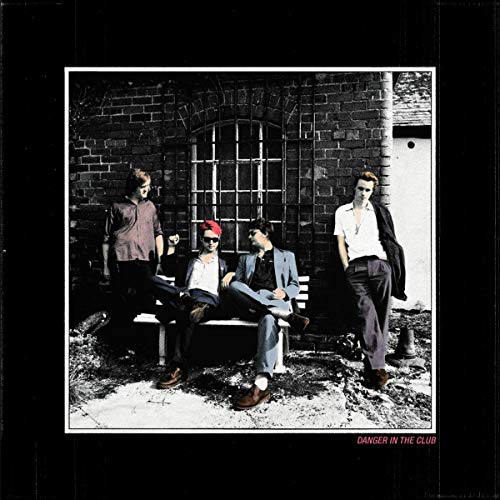 Palma Violets album cover: four people on a bench in front of a wall.