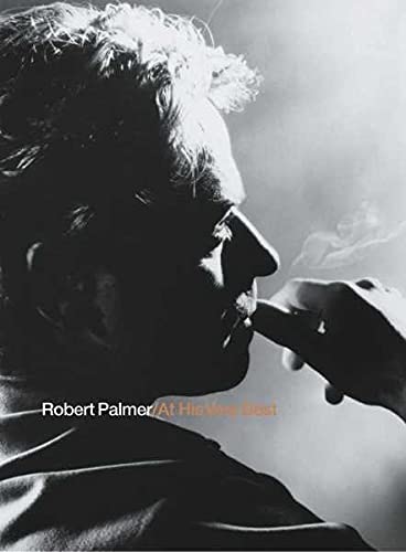 Black and white portrait of Robert Palmer smoking a cigarette, CD cover.