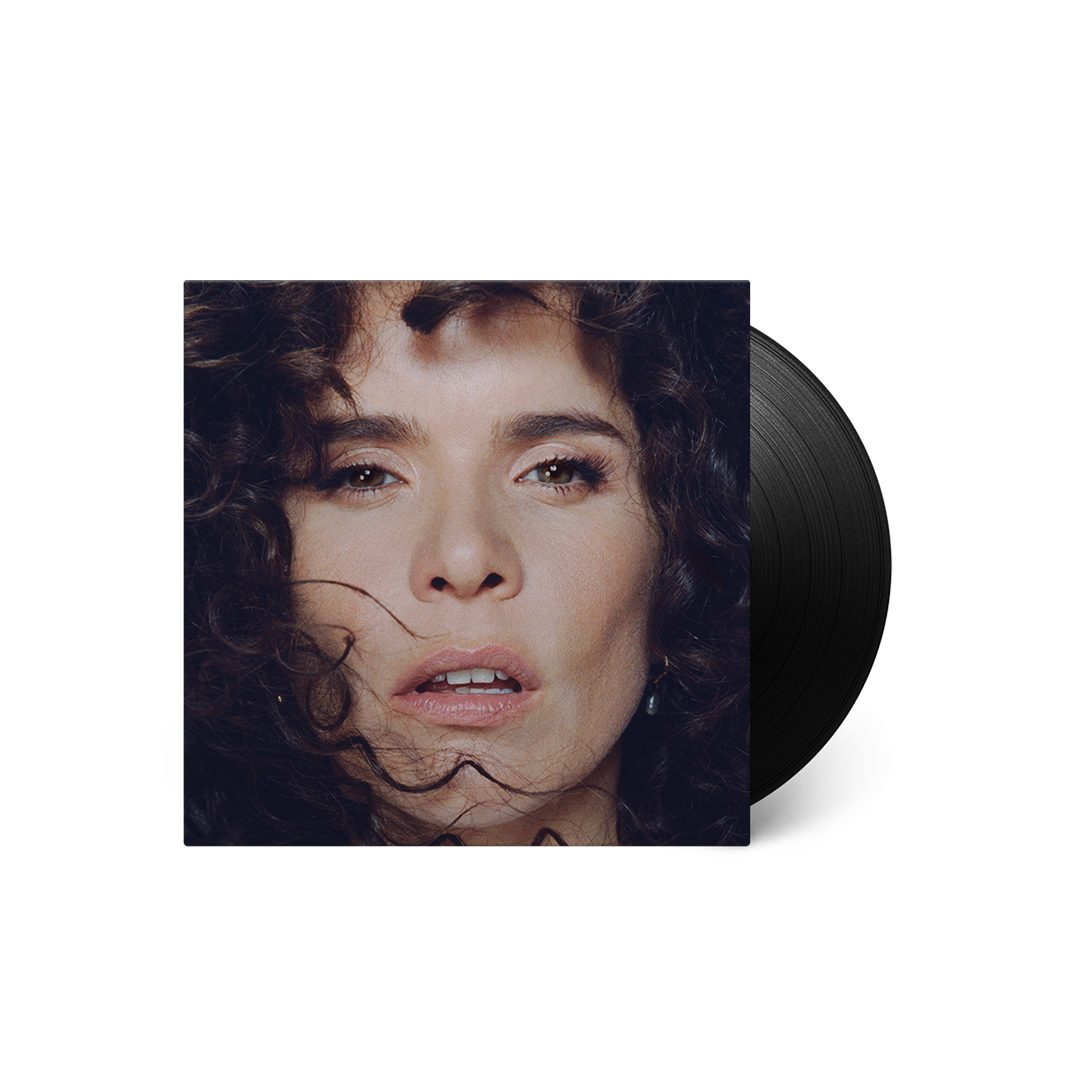 Paloma Faith album cover featuring a close-up portrait and vinyl record.
