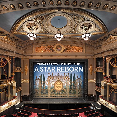 Ornate theatre interior with stage displaying “A Star Reborn” title.