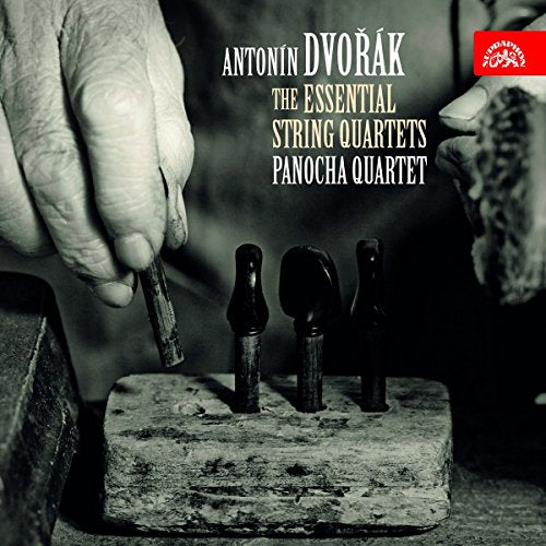 CD cover featuring hands, violin pegs, and text: Dvorak String Quartets.