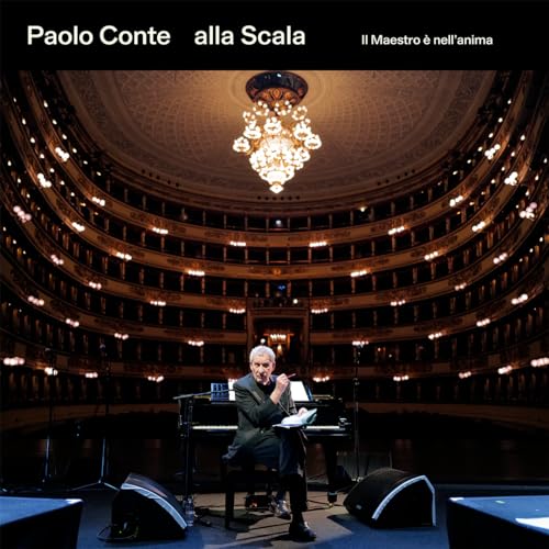 Paolo Conte at a piano on stage in the Teatro alla Scala.