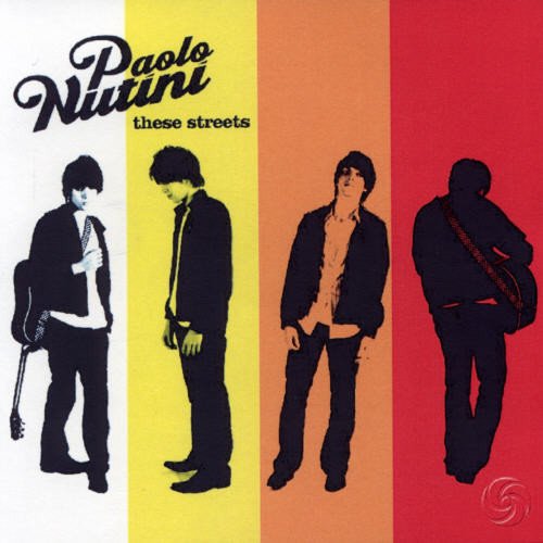 "Album cover with four panels featuring a man in different poses and colors."