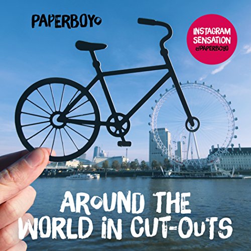 Black paper bicycle cut-out held against London skyline backdrop.
