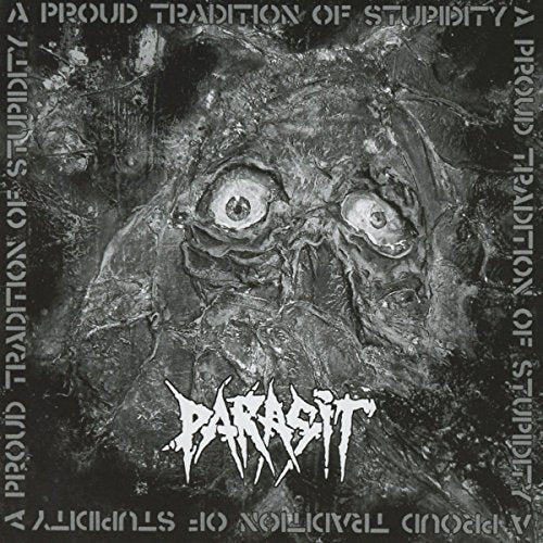 CD cover: dark, textured image of a grotesque face with large eyes.