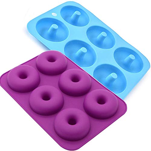 Blue and purple silicone molds with circular indentations for baking.