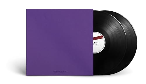 Purple vinyl record sleeve and two black vinyl LPs with white labels.