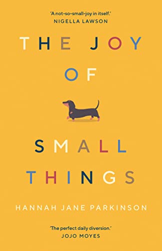 Book cover with yellow background, multicolored text, and a small dachshund illustration.