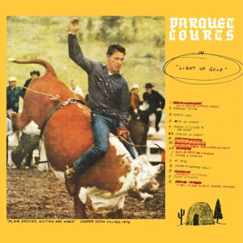 Album cover featuring a man riding a bucking bull with a yellow background.