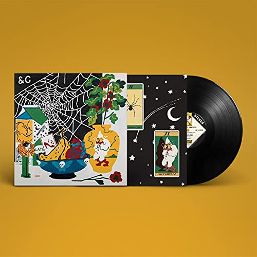 Parquet Courts vinyl record with illustrated cover featuring a spiderweb and fruit.