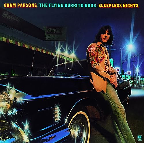 Album cover: Gram Parsons leaning on a car at night.