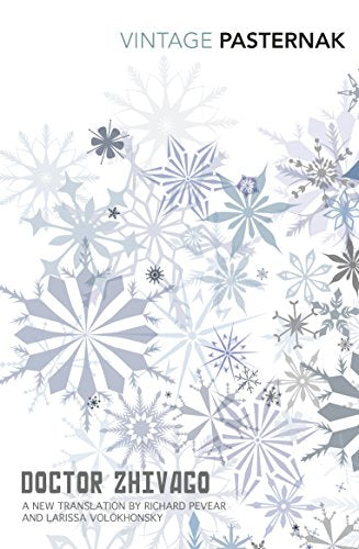 "Book cover with white background, blue and grey snowflakes, and title 'Doctor Zhivago'."