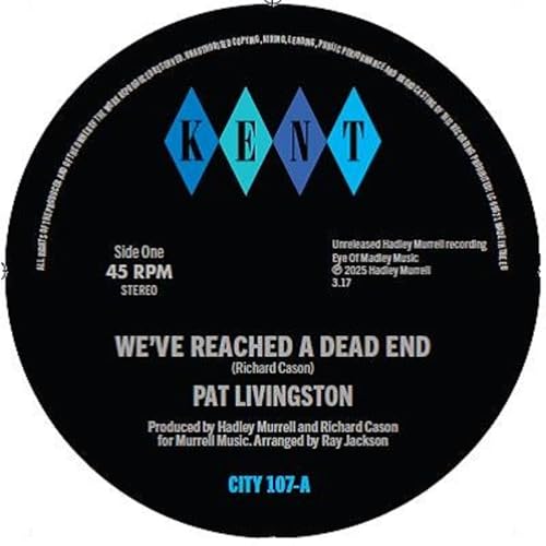 Black vinyl record label with blue diamond logos and white text.
